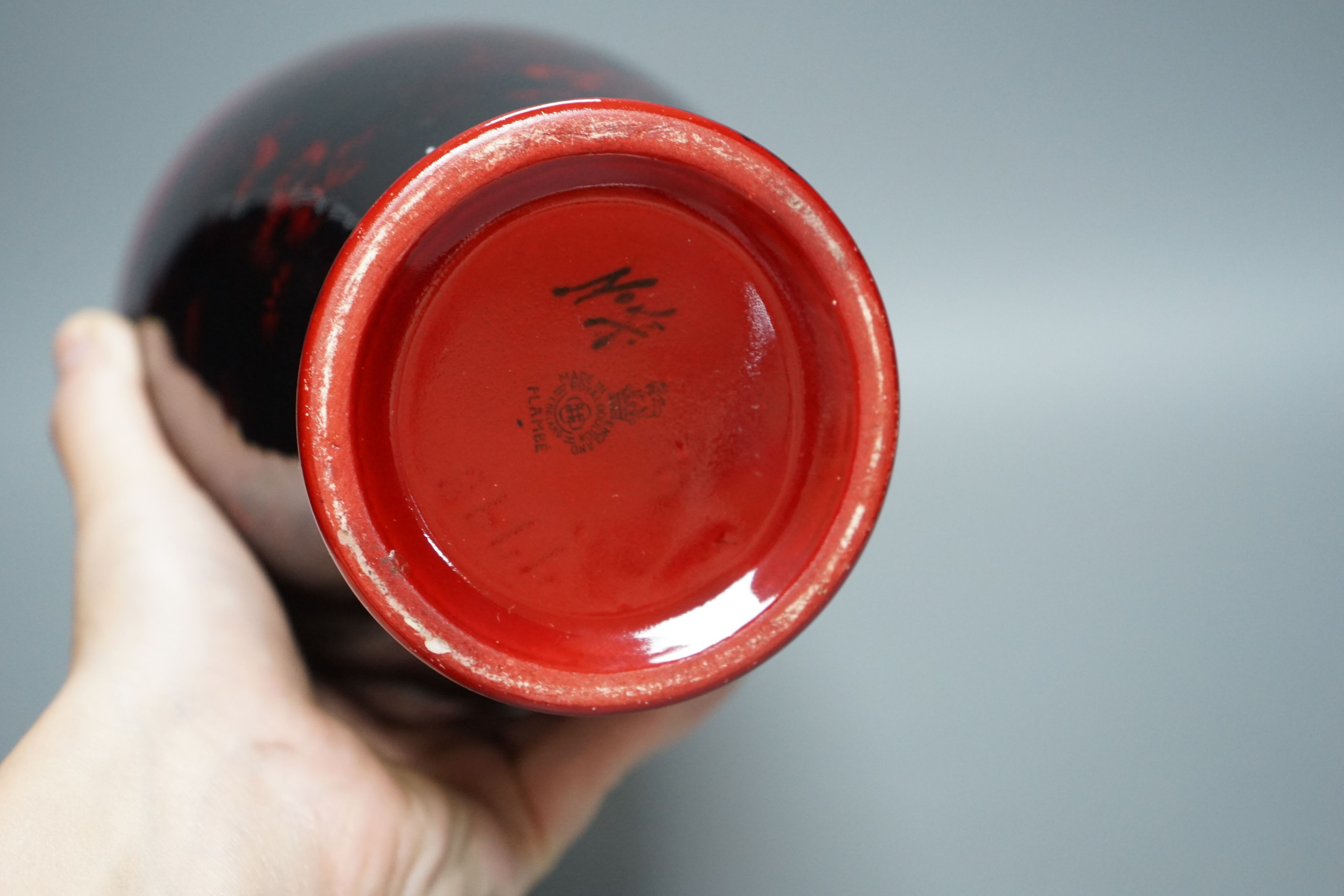 A Royal Doulton flambé vase, signed Noke, 28cms high